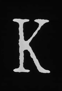 K.