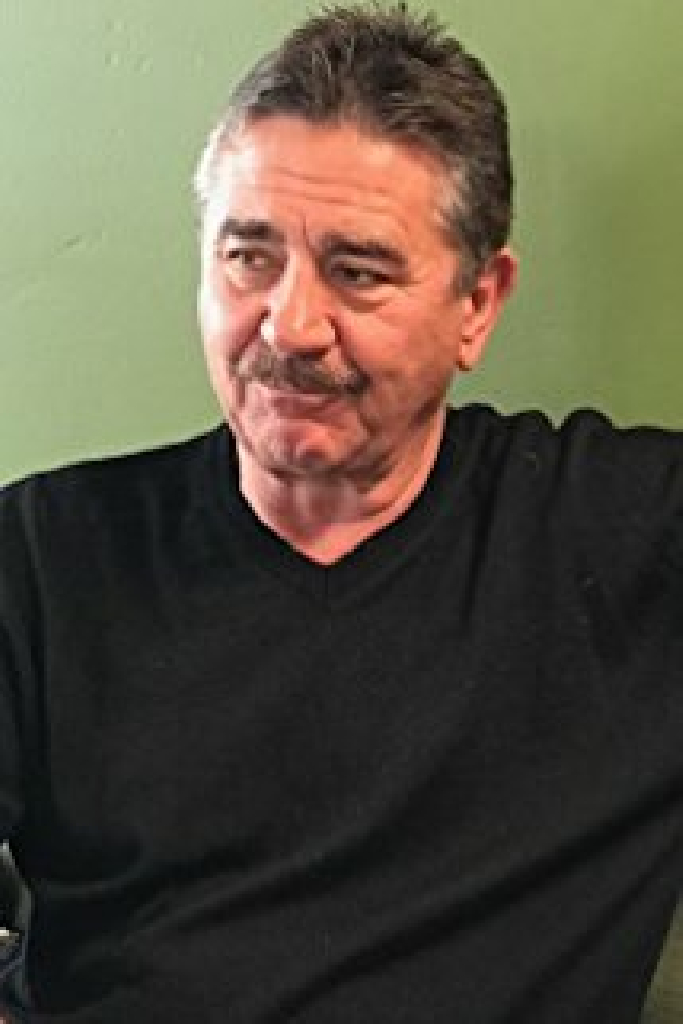 Лу Комиси