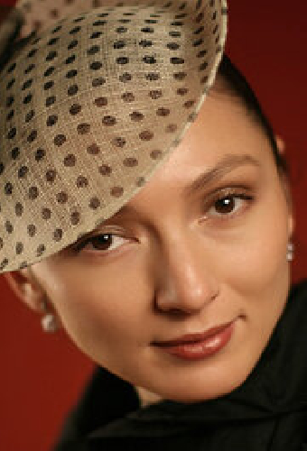 Елена Цай